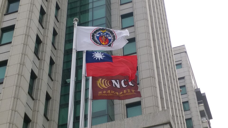 ROC_flag,_MOTC_flag,_and_NCC_flag_at_Transportation_and_Communication_Building_20141028 ROC flag, MOTC flag, and NCC flag at Transportation and Communication Building 20141028